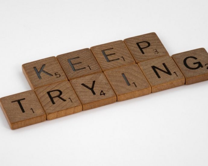scrabble, scrabble pieces, lettering, letters, wood, scrabble tiles, white background, words, quote, letters, type, typography, design, layout, focus, bokeh, blur, photography, images, image, keep trying, do the work, work, put in the hours, laziness, procrastination, nocrastination, do it, just do it, keep going, don't stop, persistence, grind, one step at a time, one foot after the other, pressing on, press on,